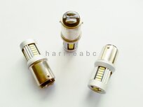 BA15D 12 volt 21/4 watt massa positief  in kleur warm wit en rood